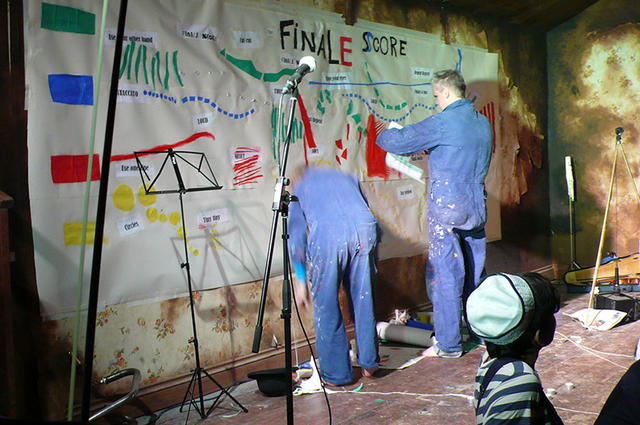 Working on the score with instructions from the audience